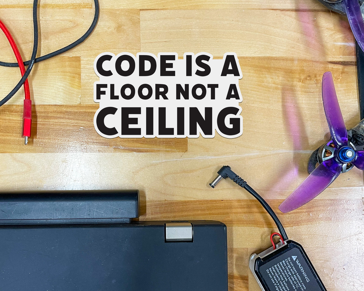 Code is a Floor, Not a Ceiling Sticker